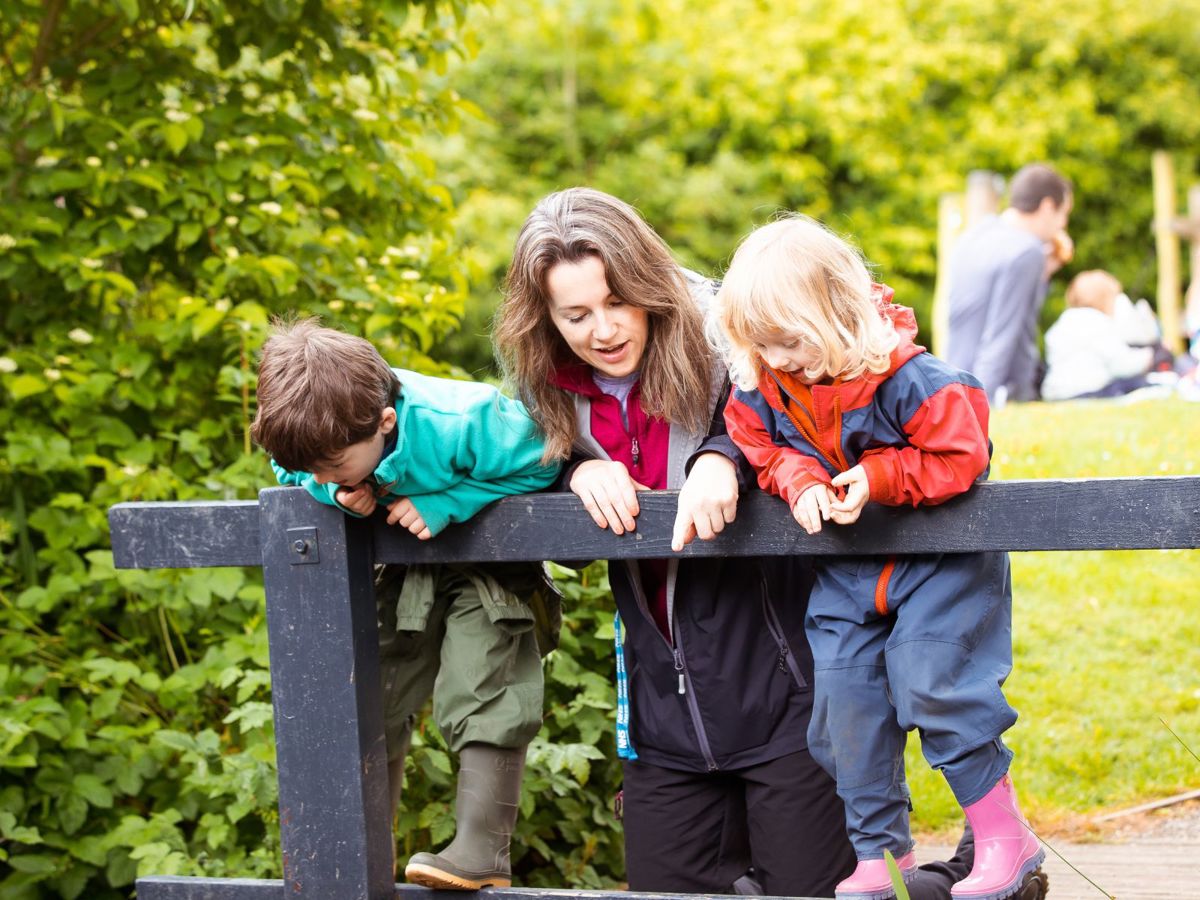 Children looking at pond