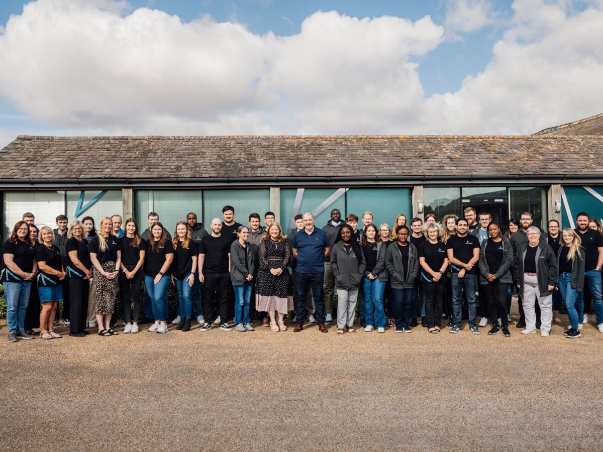 Ad Valorem Team stood outside Manor Farm Court building