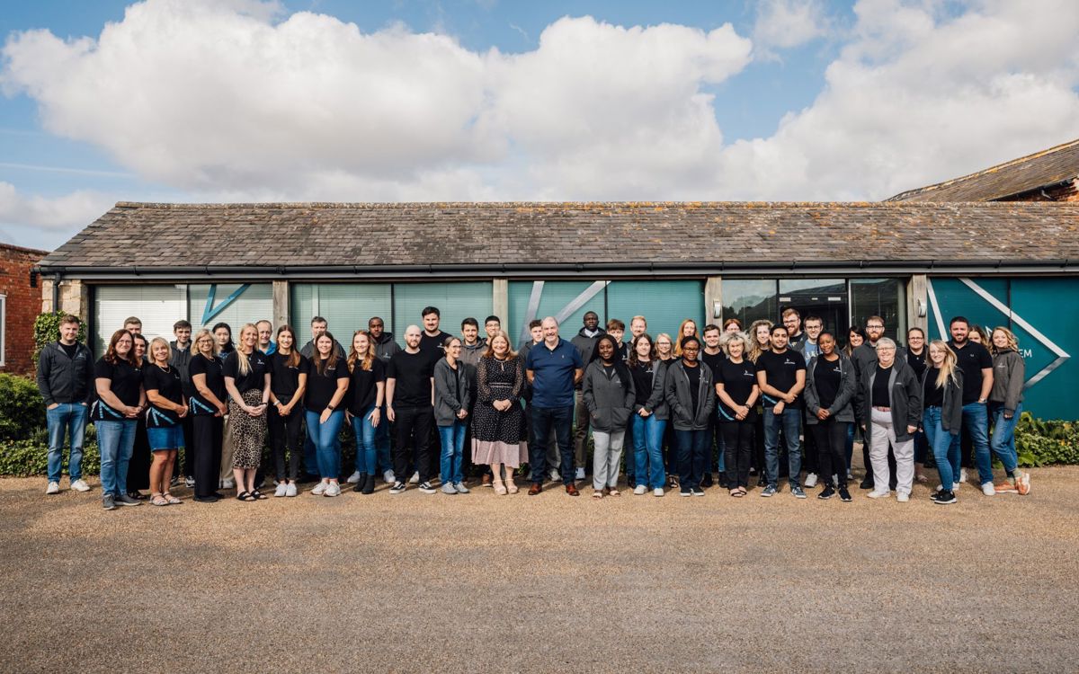 Ad Valorem Team stood outside Manor Farm Court building