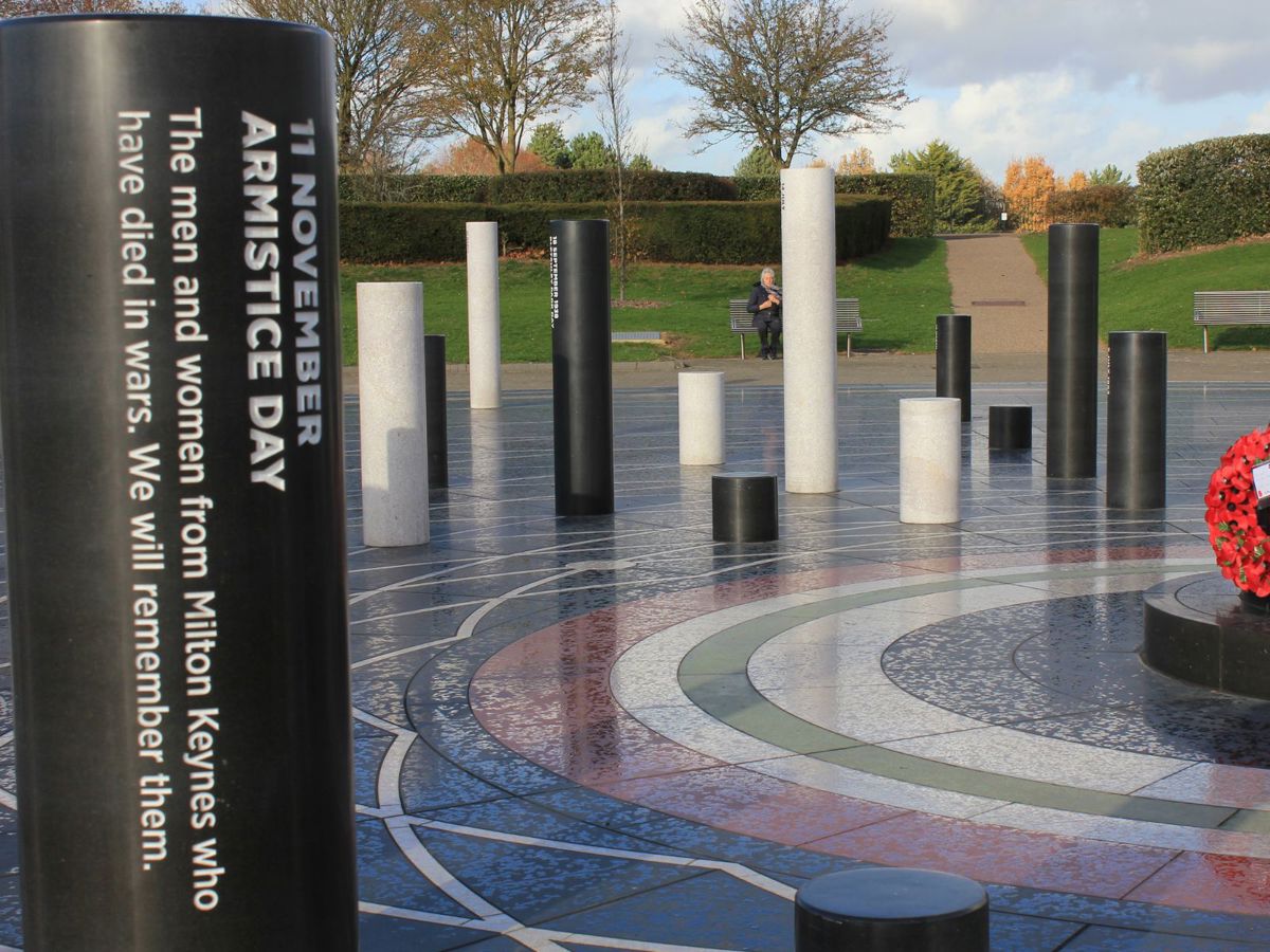 Rose wreaths on Milton Keynes Rose sculpture in Campbell Park