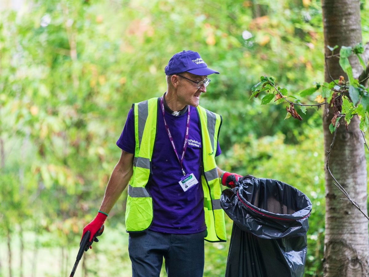 Volunteer ranger litter picking in Milton Keynes park