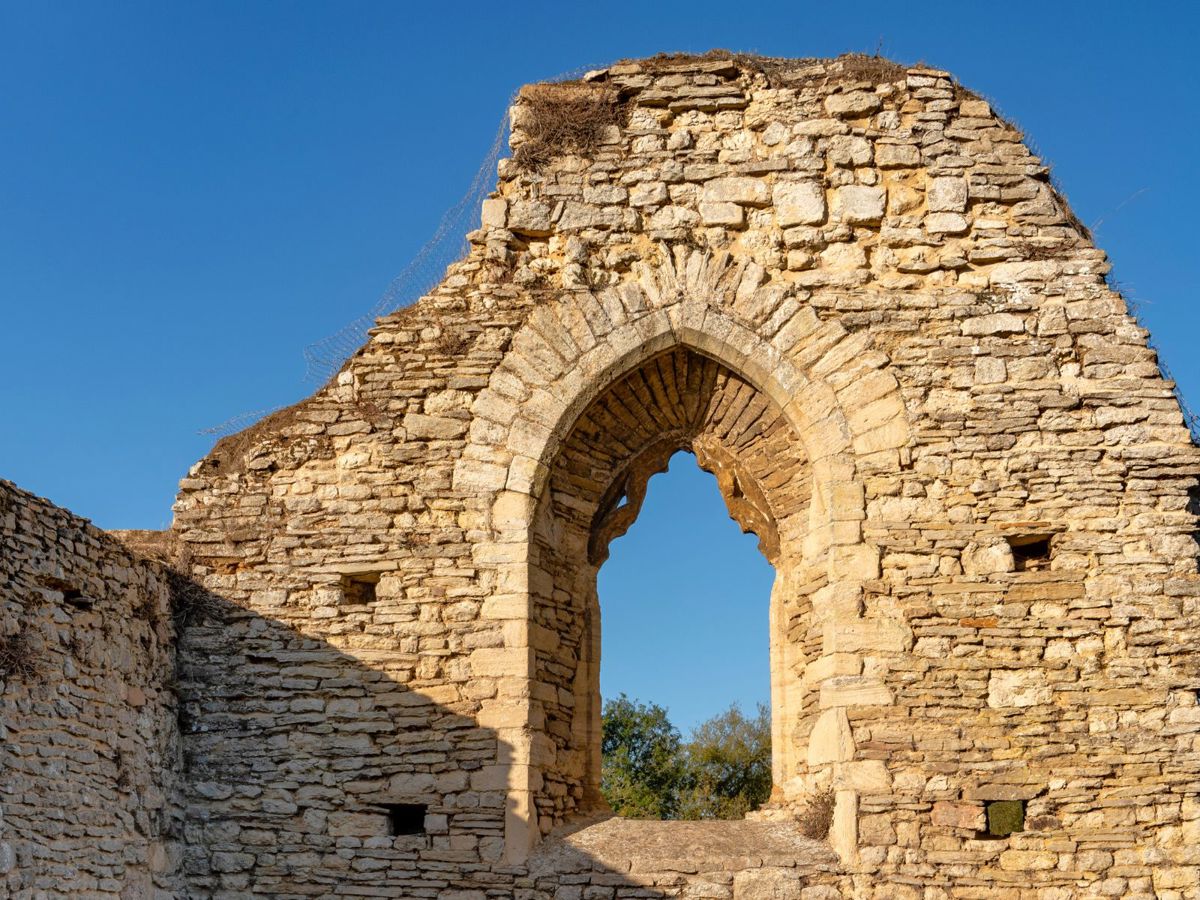 Church arch ruins with blue sky
