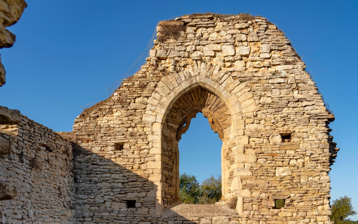 Church arch ruins with blue sky