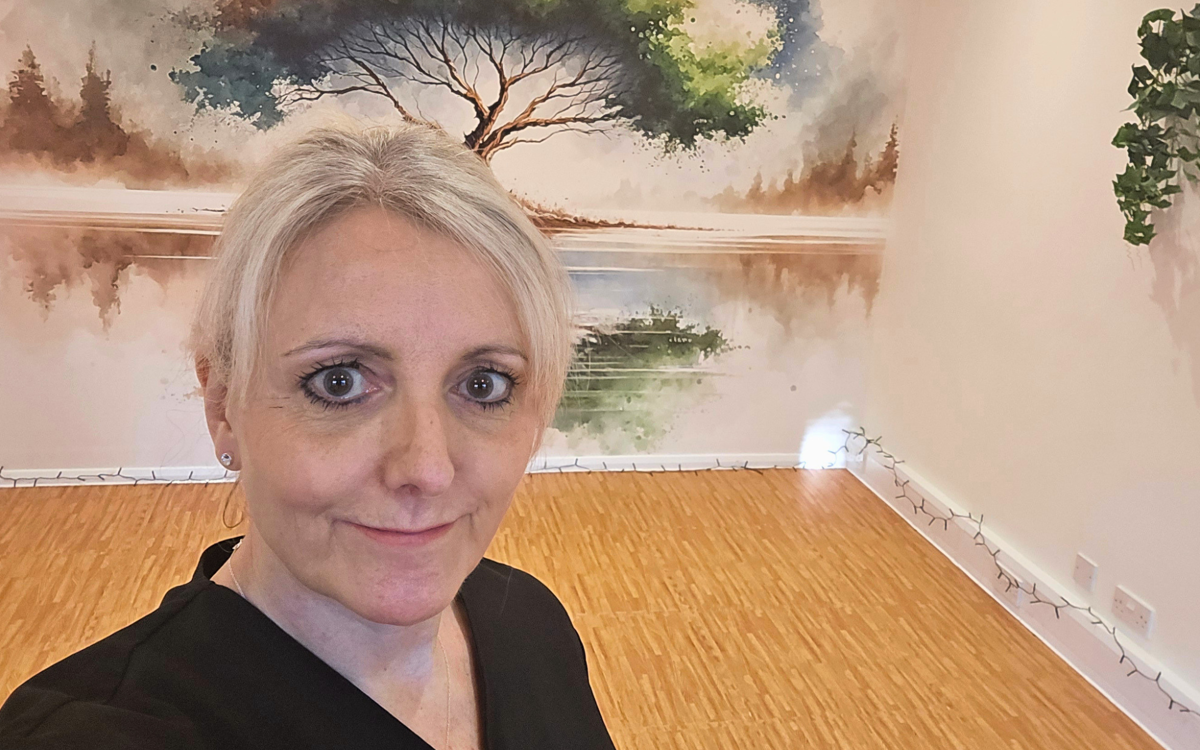 Business owner Sharon Stevens smiling.