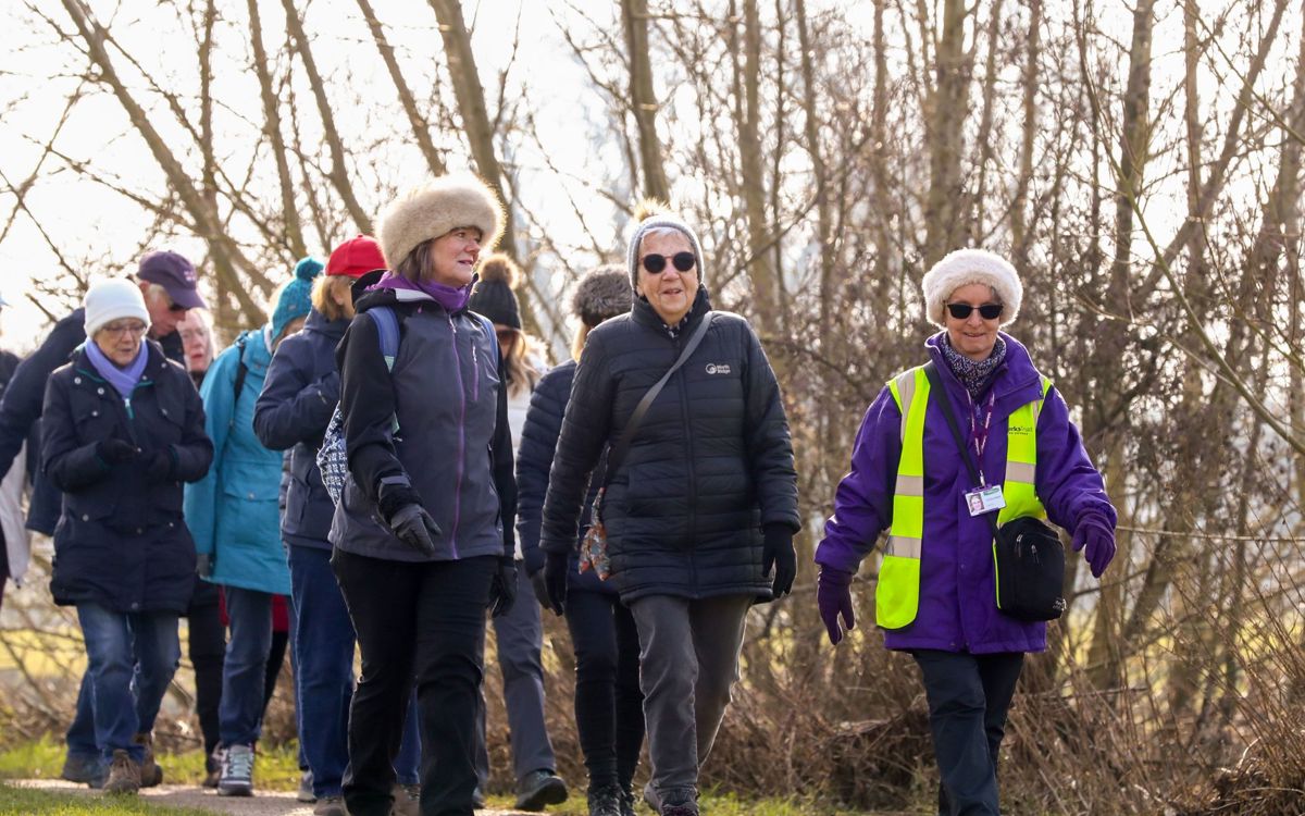 Group of people walking in winter
