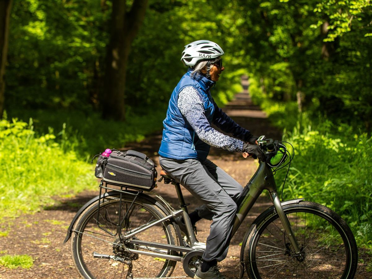 Person cycling in Milton Keynes park