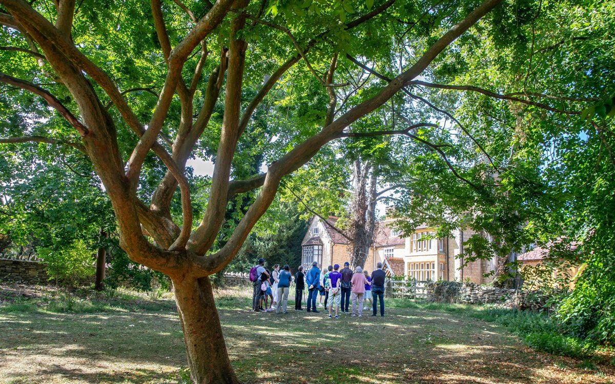 Public gathered on a guided walk at Great Linford Manor 