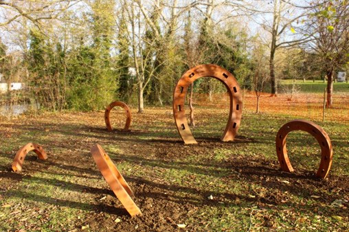 Metal horseshoe play sculptures