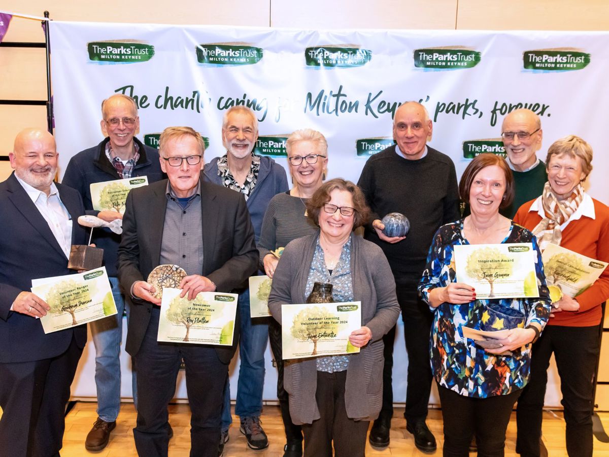 Group of Parks Trust volunteers holding their certificates