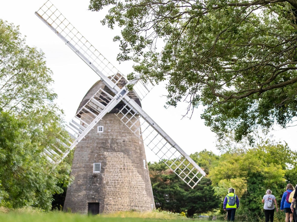 Bradwell Windmill with walkers in the foreground