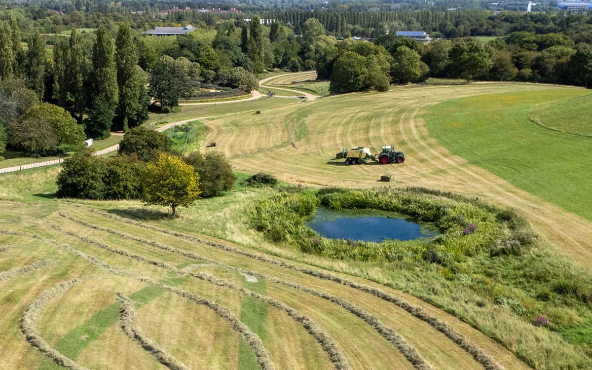 Drone photo of tractor cutting hay in Campbell Park