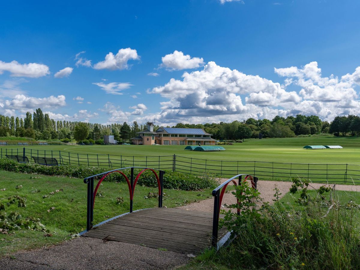 Campbell Park Office With Bridge And Cricket Pitch