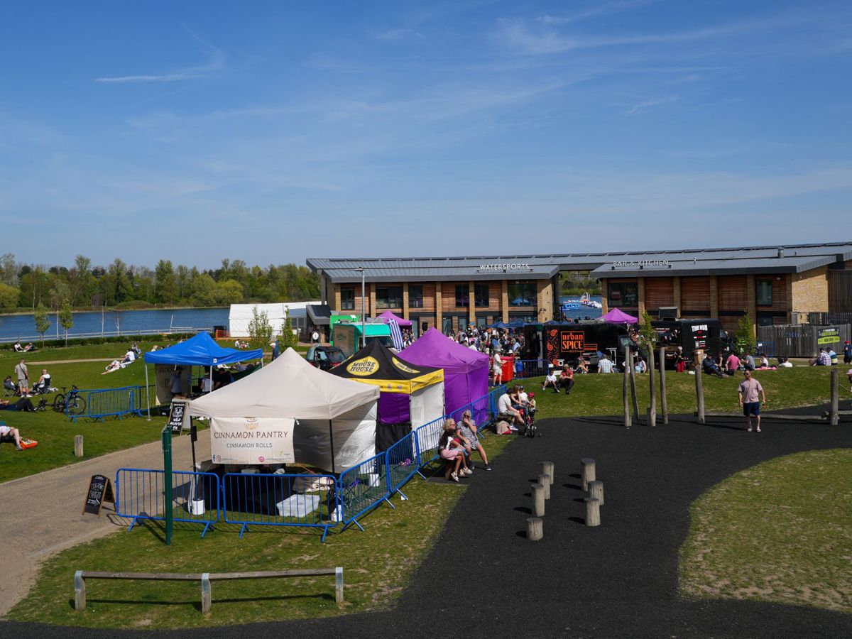 Food event with stalls taking place in front of watersports centre