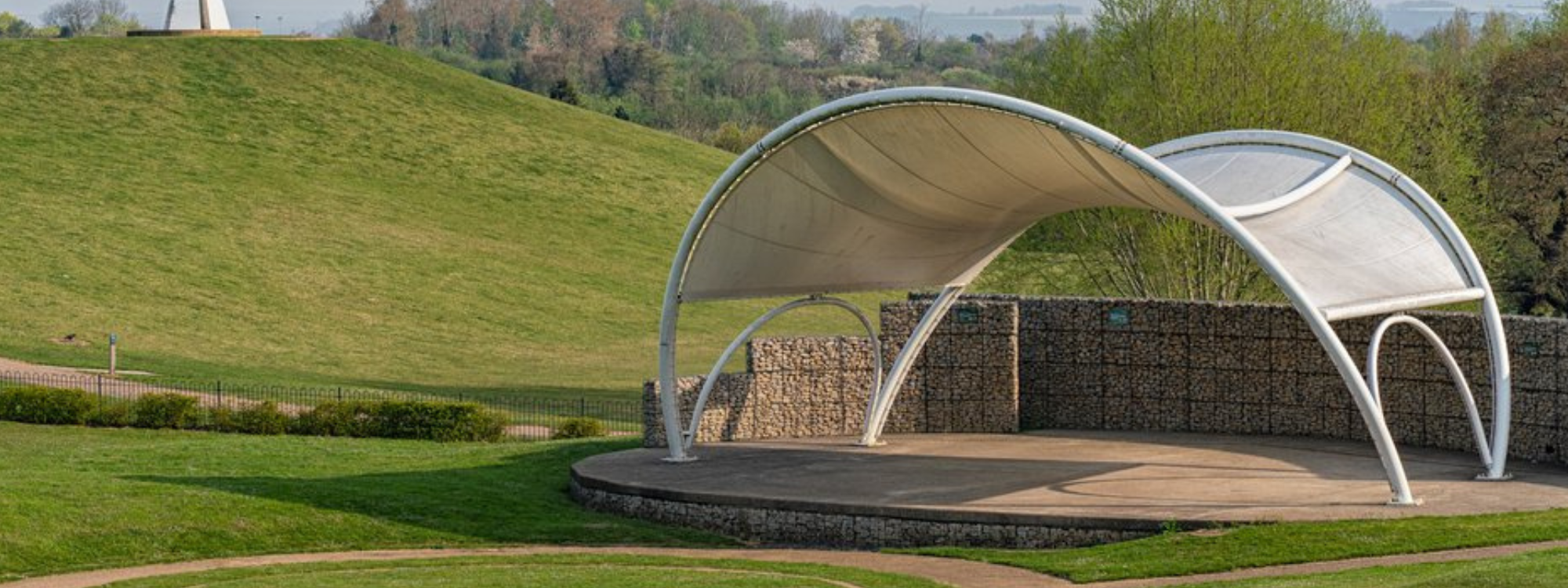 Amphitheatre at Campbell Park with the light pyramid structure at the top of the hill in the background