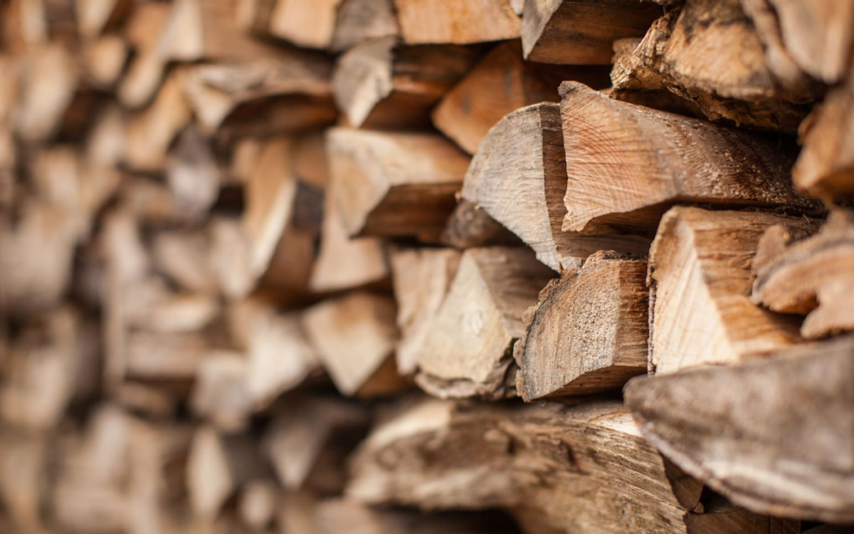 Close up view of a stack of processed firewood