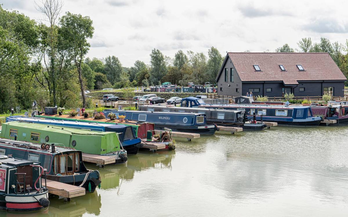 Campbell Wharf Marina reception with colourful canal boats