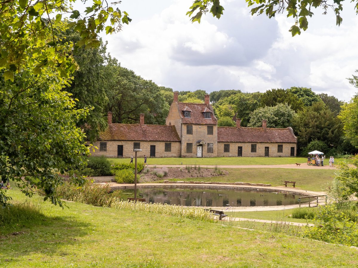 view of the Alms houses at the Great Linford Manor Park on a sunny day 