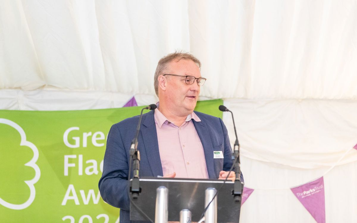 Nick Lloyd, The Parks Trust Chair speaking into microphone