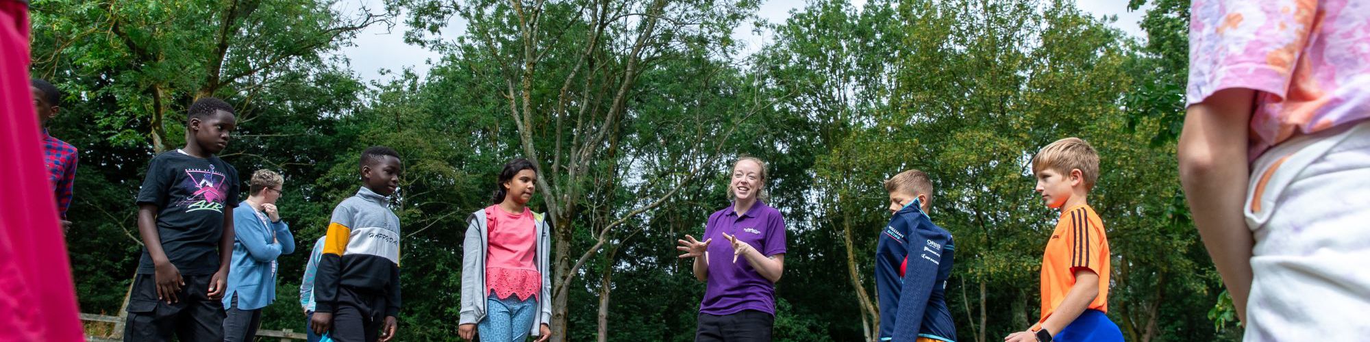 School children at an outdoor learning session in Milton Keynes park
