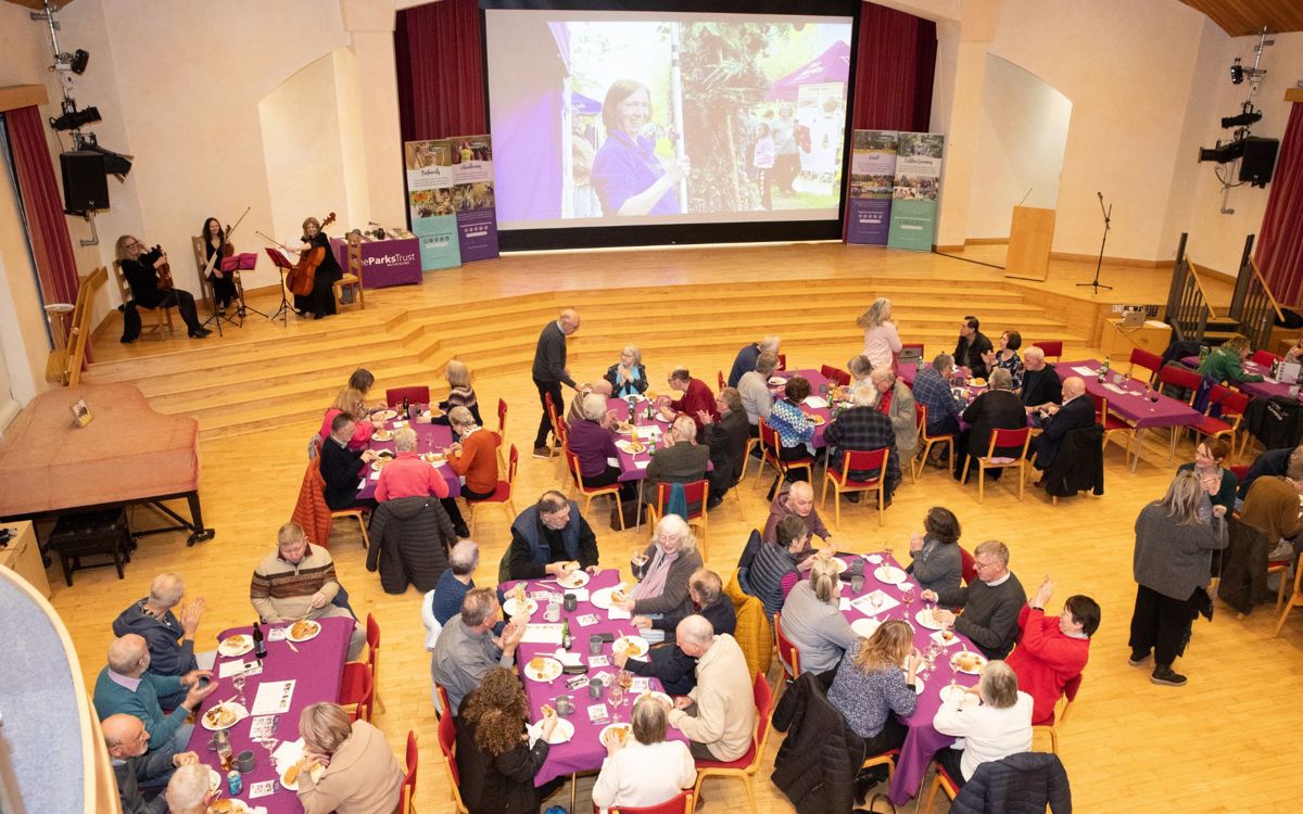Seated tables with stage and presentation