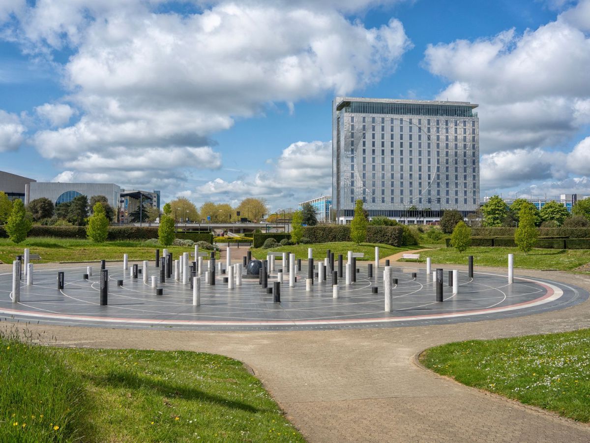 The Milton Keynes rose sculpture , on a sunny day