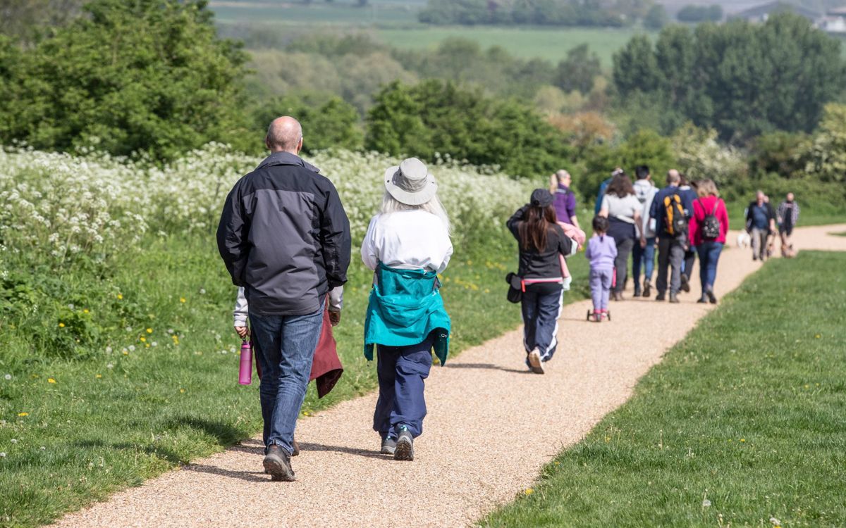 Group of people on a guided walk in Milton Keynes park