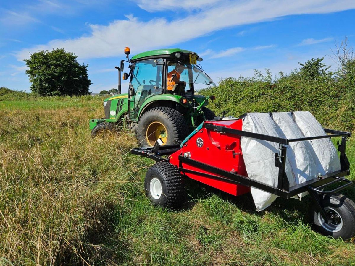 Tractor and seed harvester machinery in Milton Keynes park