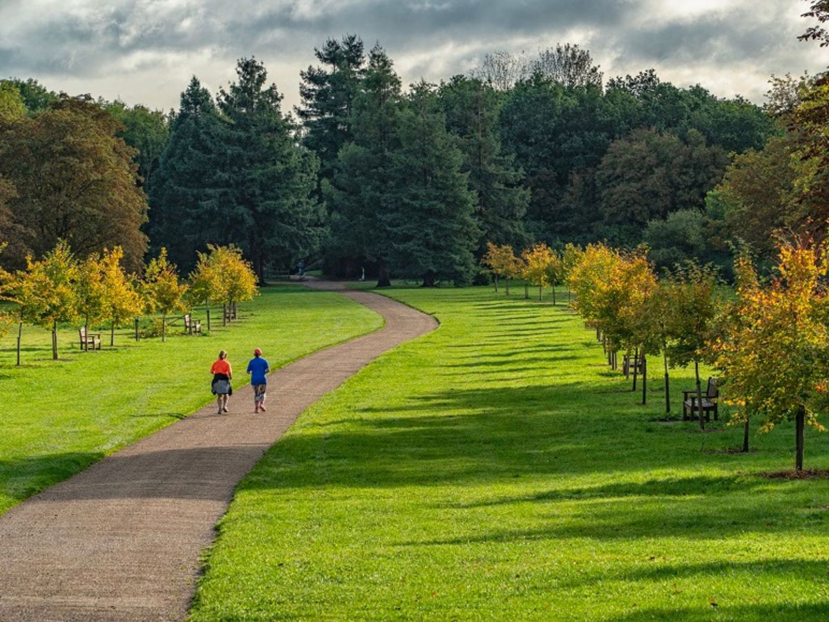 Two people running in Newlands park in Milton Keynes