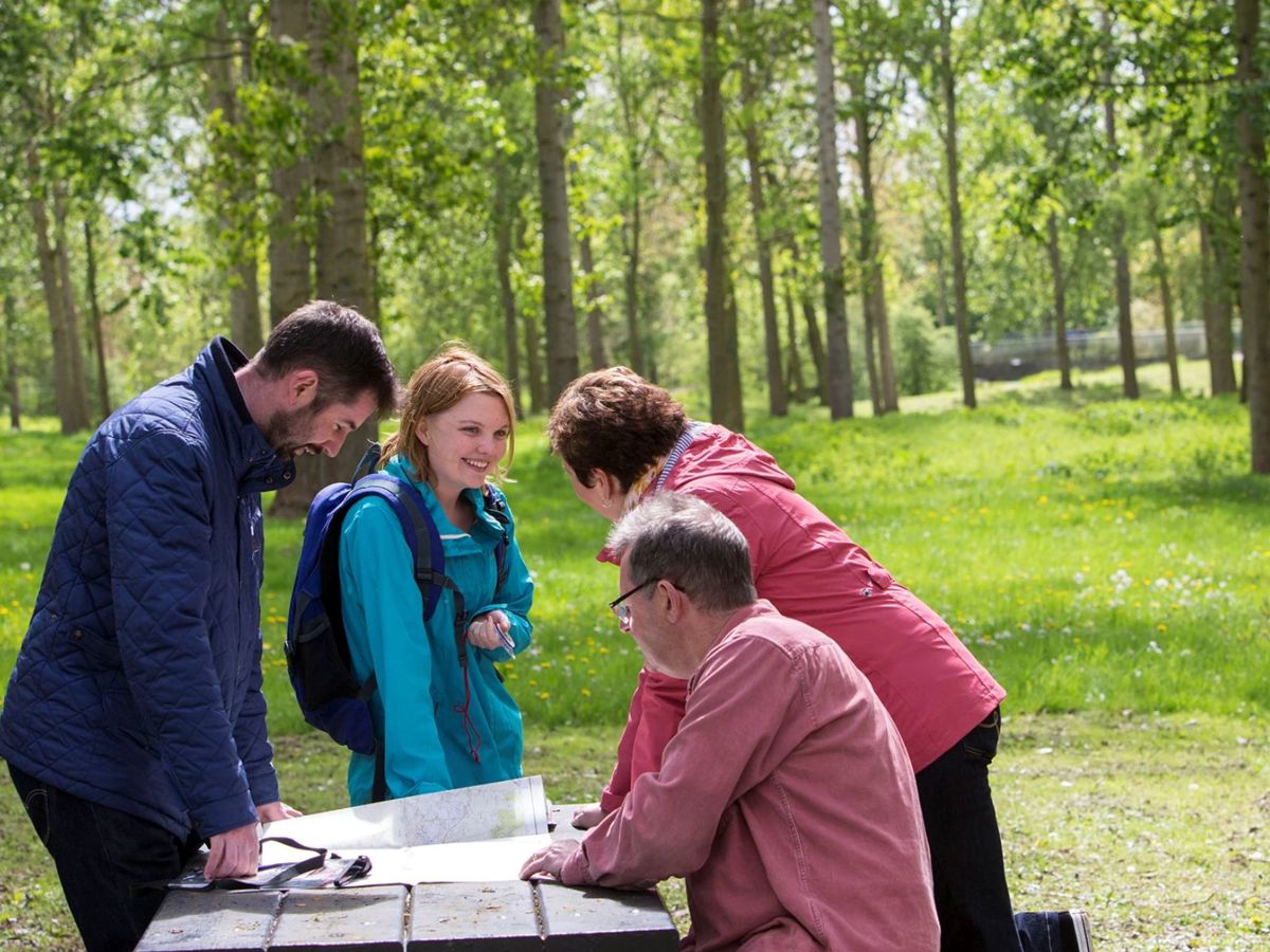 Group of people orienteering in Poplar Plantation 