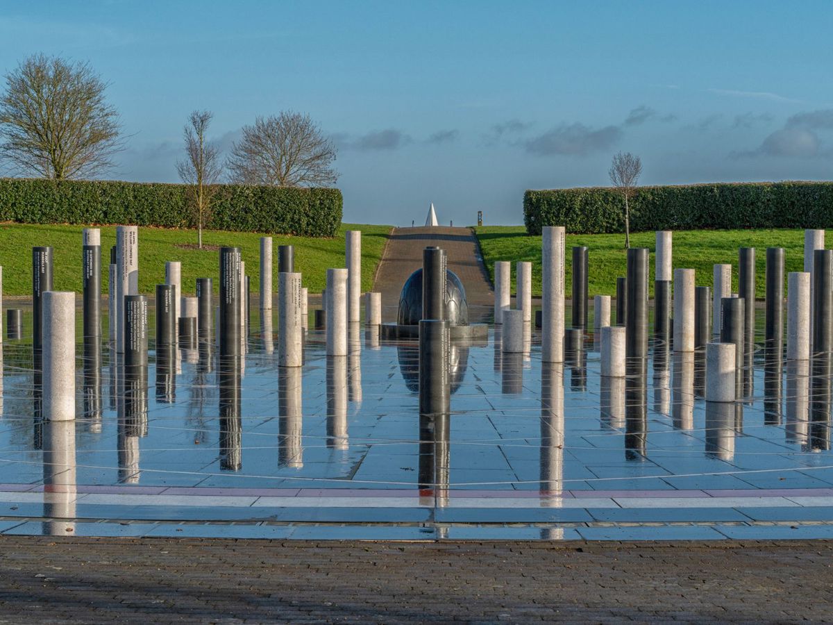 Milton Keynes Rose sculpture with black and white pillars