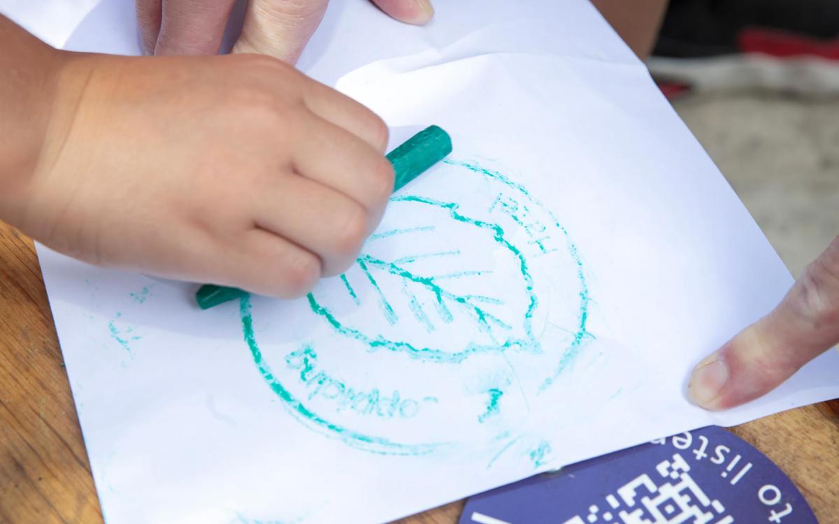 Paper and crayon rubbing over disk