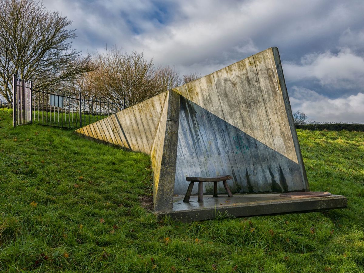 Wooden sculpture with stool in Campbell Park in Milton Keynes