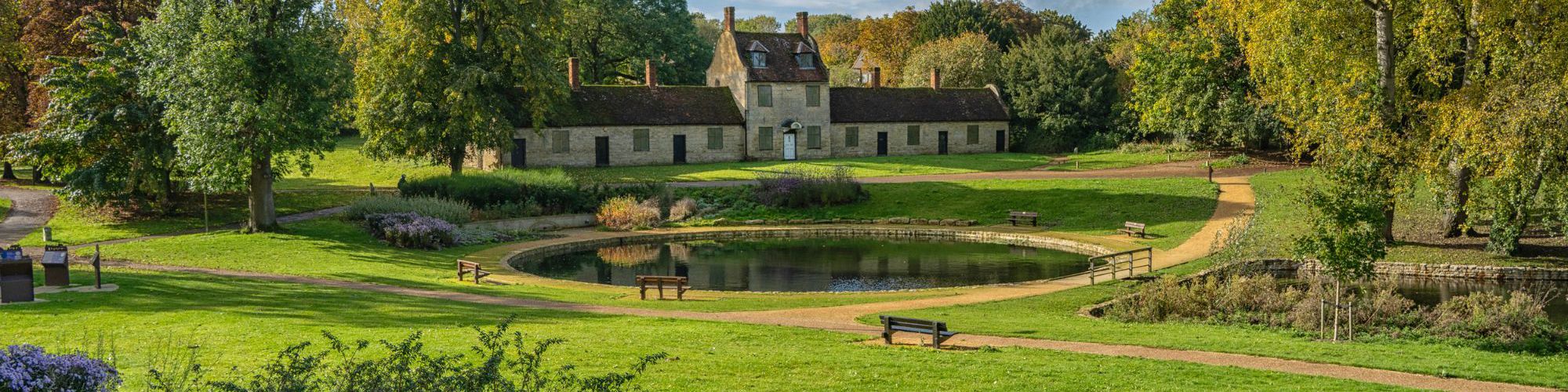 Almshouses and pond in Great Linford Manor Park