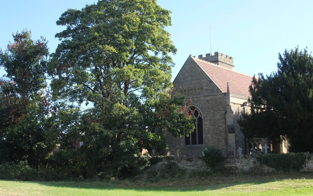 Stone church with trees  