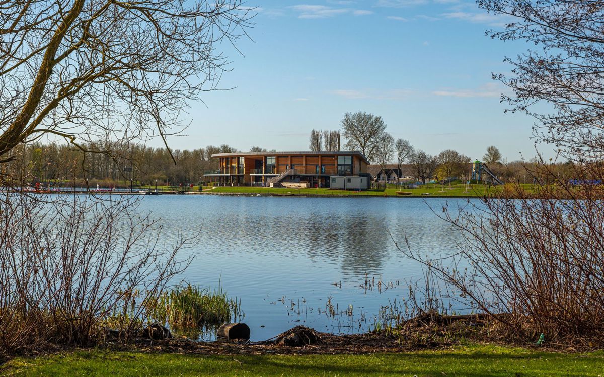 Willen Lake watersports centre from across the lake